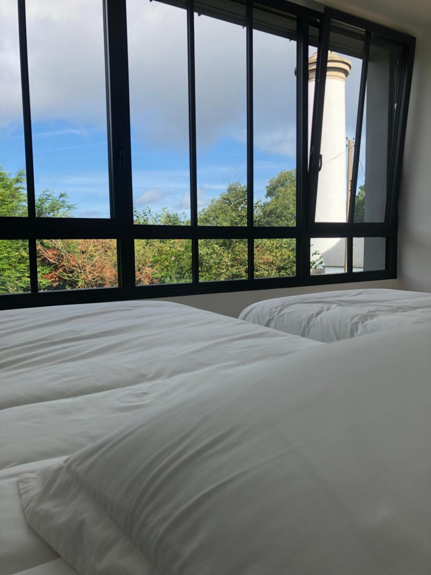 Les Ecolodges Sous Le Phare Louannec Esterno foto